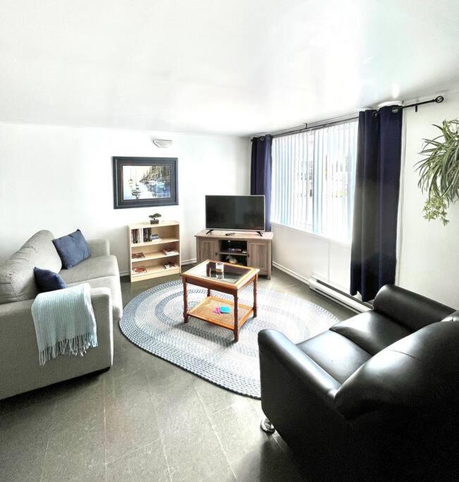 Les Appartements Du Vieil Edifice Metabetchouan Buitenkant foto